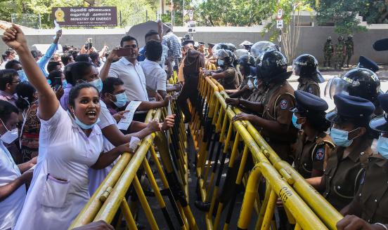 Sri Lankan health workers shout slogans in protest amid the countrys economic crisis in Colombo, Sri Lanka, June 29, 2022.