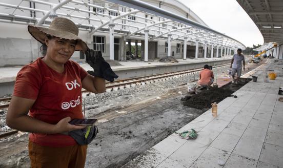 Chinese workers help to build a new train station in Beliatta in a southern province near Hambantota which is Chinese managed and designed on November 18, 2018 in Beliatta, Sri Lanka.