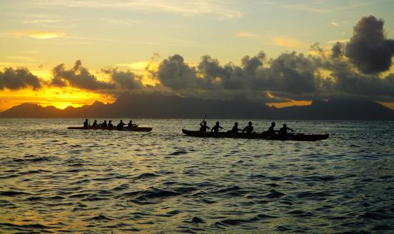 Two long boat teams during an evening training session on April 12, 2017 in Tahiti, French Polynesia.