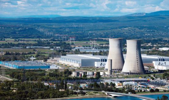 Power plant with countryside in background 