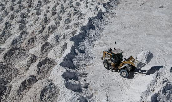 A lithium mining machine moves a salt by-product at the mine in the Atacama Desert in Salar de Atacama, Chile on October 25, 2022. 