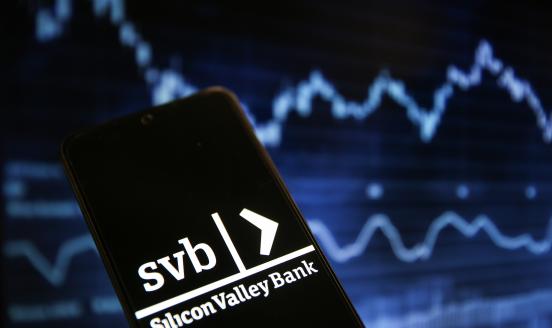 In this photo illustration, logo of Silicon Valley Bank (SVB) is displayed on a mobile phone screen in Istanbul, Turkiye on March 13, 2023. 