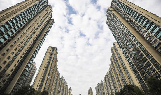 The Evergrande Mingdu residential complex, owned by Evergrande Group, is seen in Huai 'an, Jiangsu province, China, December 3, 2022. On the evening of July 17, 2023, China Evergrande Group's financial report showed that Evergrande had a two-year loss of more than 812 billion yuan and total liabilities of more than 2.4 trillion yuan. (Photo by Costfoto/NurPhoto via Getty Images)