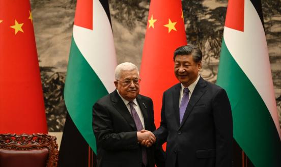 Palestinian President Mahmud Abbas shakes hands with China’s President Xi Jinping after a signing ceremony at the Great Hall of the People in Beijing on June 14, 2023. 