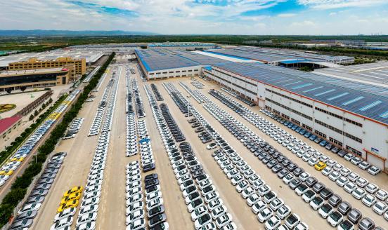 JINZHONG, CHINA - JUNE 21: Aerial view of new vehicles sitting parked at a plant of Geely Auto Group on June 21, 2022 in Jinzhong, Shanxi Province of China. (Photo by VCG/VCG via Getty Images)