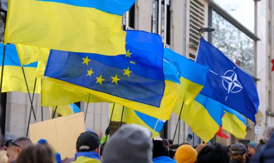 BRUSSELS, BELGIUM - MARCH 2: People demonstrate on 'Avenue des Arts' in front of the USA embassy on March 2, 2025 in Brussels, Belgium. Protestors hold European Union, North Atlantic Treaty Organization (NATO) and Ukrainian flags. After the Trump / Zelenskyy clash in Washington, the European Ukraine's allies hold crucial summit in London. (Photo by Thierry Monasse/Getty Images)
