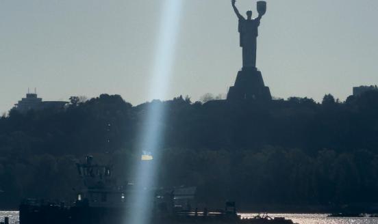KYIV, UKRAINE - SEPTEMBER 23: A Ukrainian commercial vessel flying the flag of Ukraine is sailing on the Dnipro River, with the Motherland Monument in the background on September 23, 2025 in Kyiv, Ukraine. (Photo by Andrew Kravchenko/Global Images Ukraine via Getty Images)